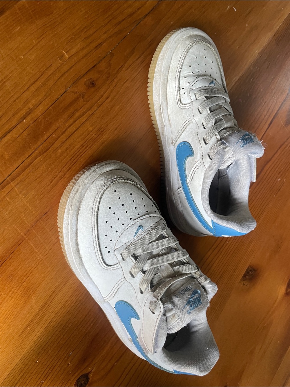 Nike Low Top Sneakers in White with Light Blue Swoosh